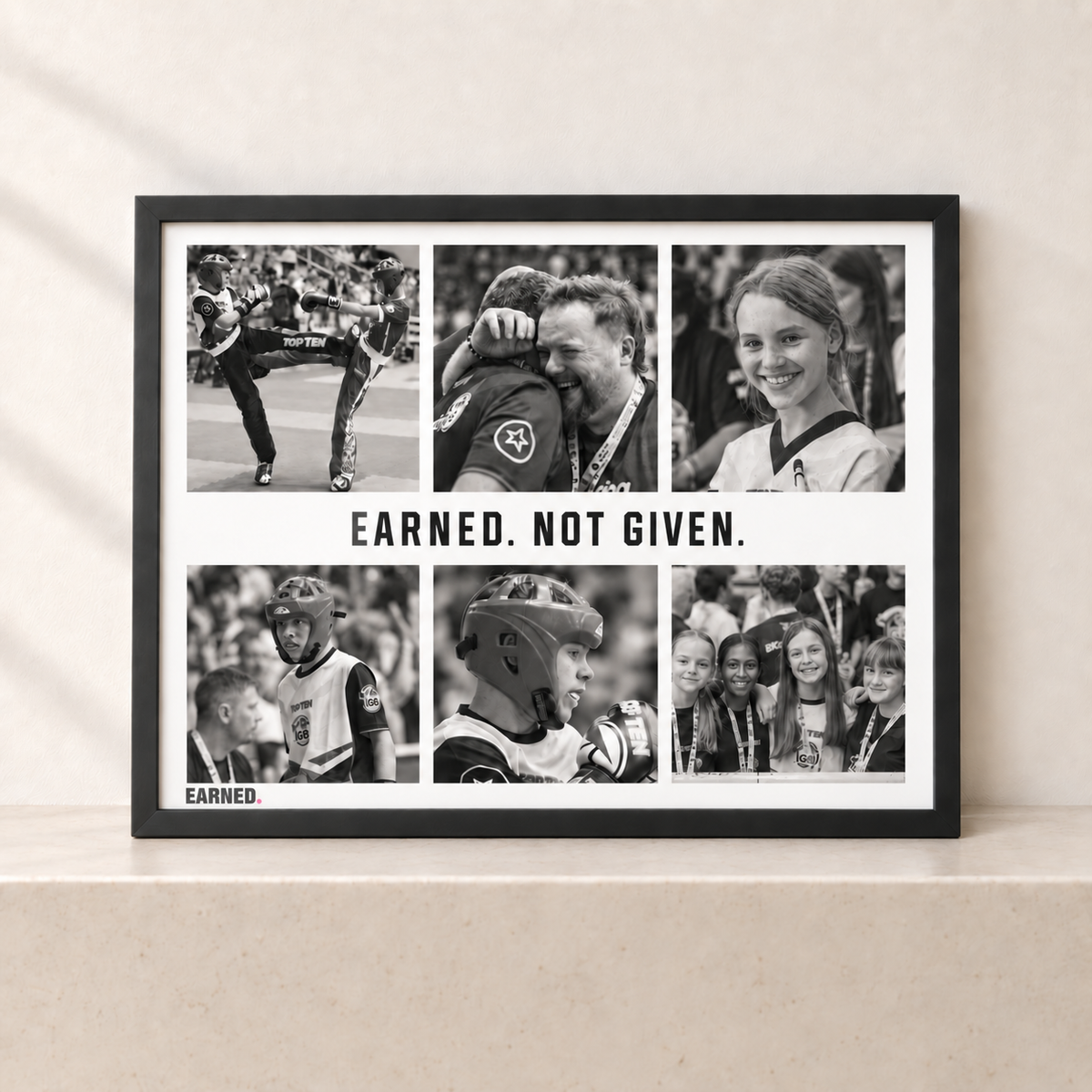 EARNED. black framed six-photo kickboxing collage with centred EARNED. NOT GIVEN. and bottom-left branding